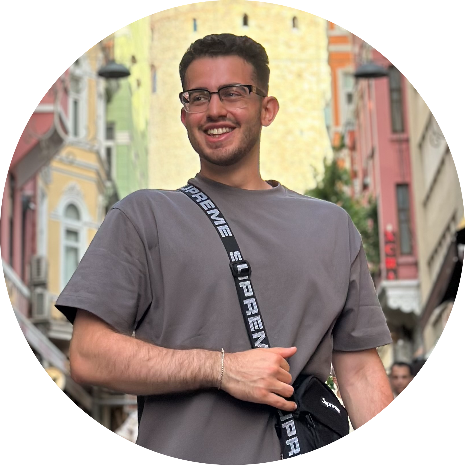 Man Smiling with Grey T-Shirt and Rectangular Glasses